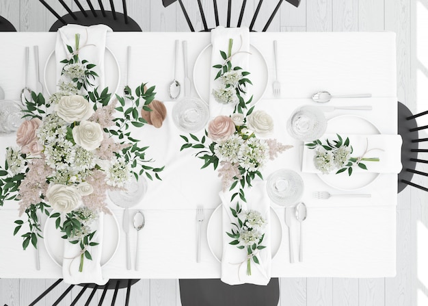 table prepared to eat with cutlery and decoration on top view