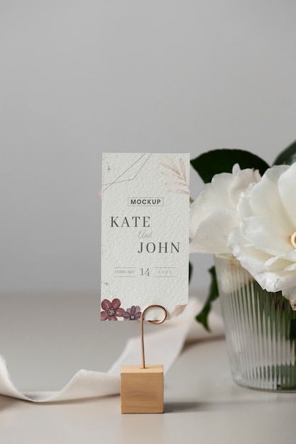 PSD table tent card mock-up design with elegant floral arrangement