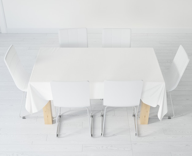 Table with tablecloth and chairs