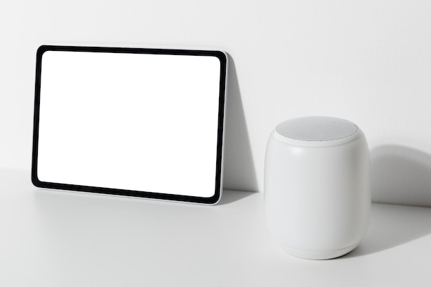 Tablet screen mockup with smart speaker