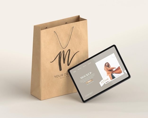 Tablet shopping and paper bag mockup