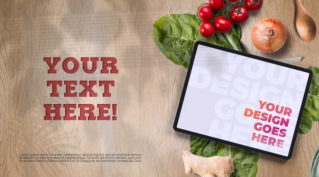 Tablet surrounded with organic vegetables mockup