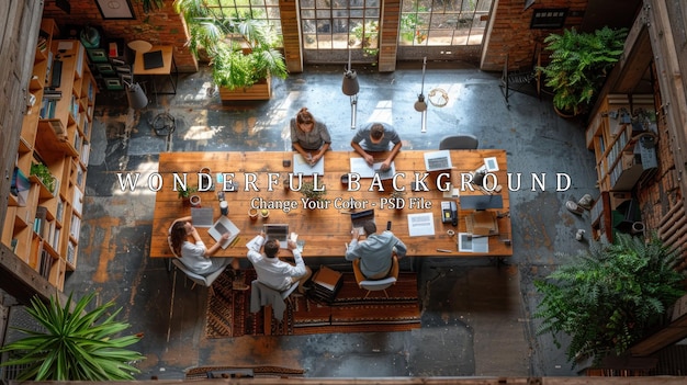 PSD team of four working at a large wooden table