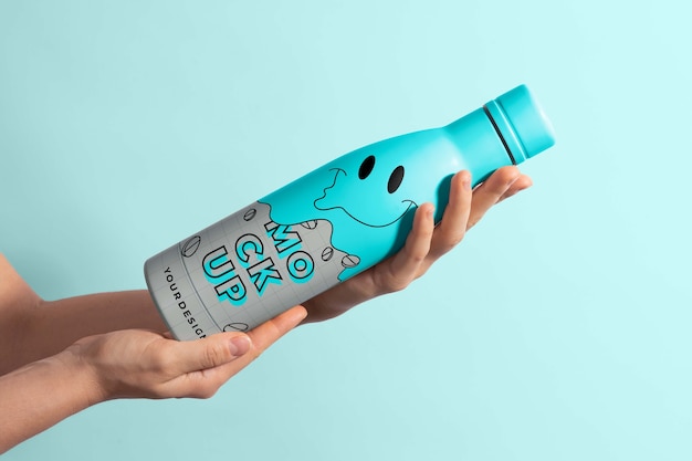 Thermo bottle mockup held in hand