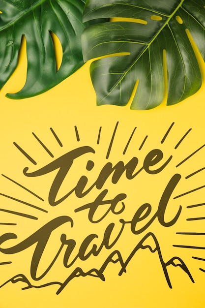 Time to travel, lettering with tropical palm leaves