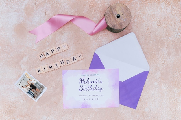 Top view of birthday card envelope with ribbon