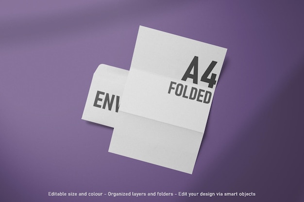 PSD top view blank editable folded a4 paper and envelope mockup scene