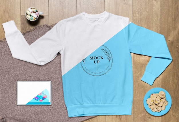 Top view blue hoodie mock-up with cookies and tablet