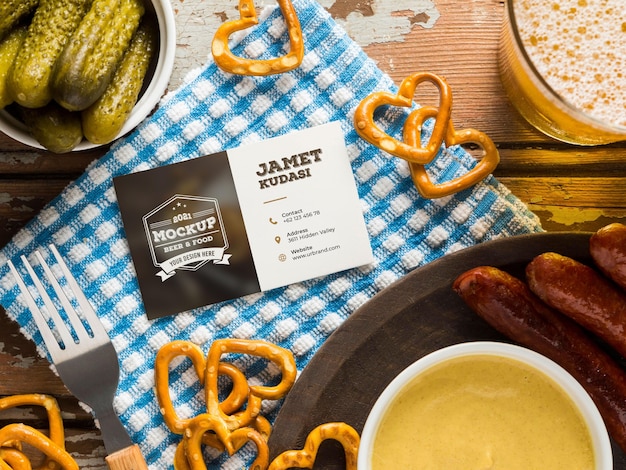 Top view card mock-up with beer and pretzels