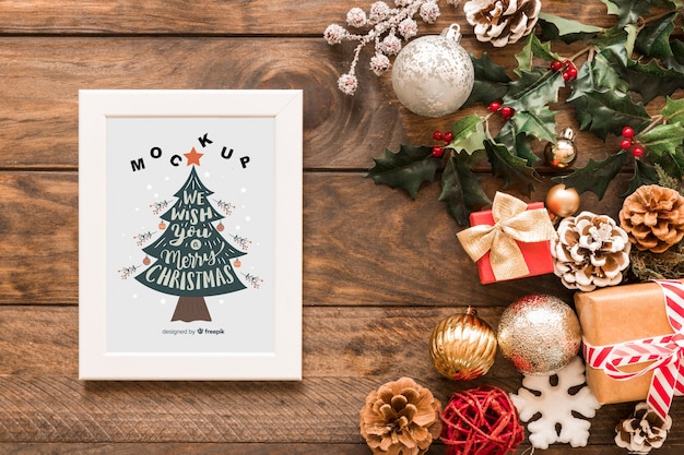 PSD top view christmas composition with frame mockup