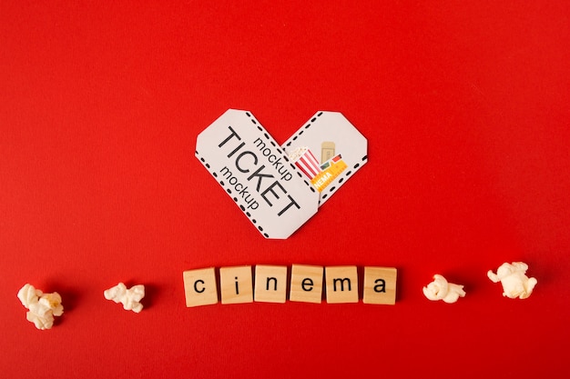 Top view cinema scrabble letters and popcorn