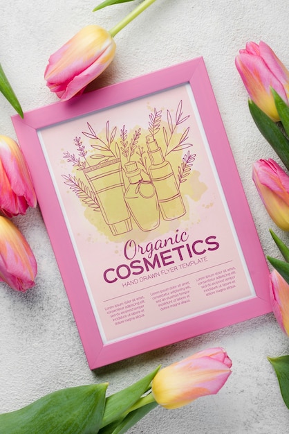 Top view cosmetics mockup with flowers