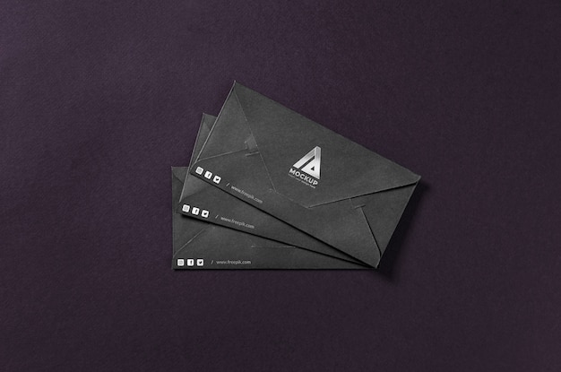 Top view over dark envelope mockup design