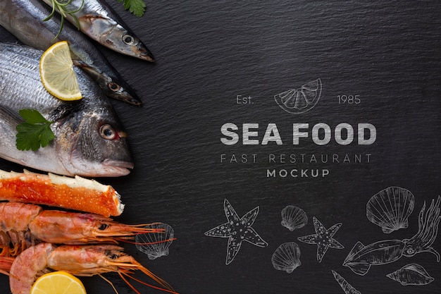 Top view delicious sea food assortment with mock-up