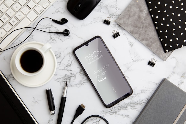 PSD top view desk concept with smartphone