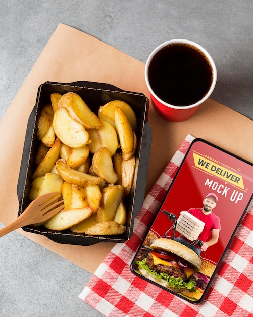 Top view fries and drink arrangement