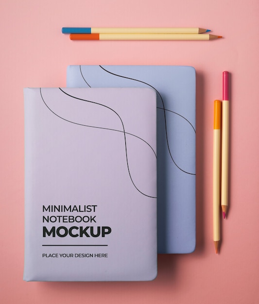 Top view of journal mock-up with colorful stationery