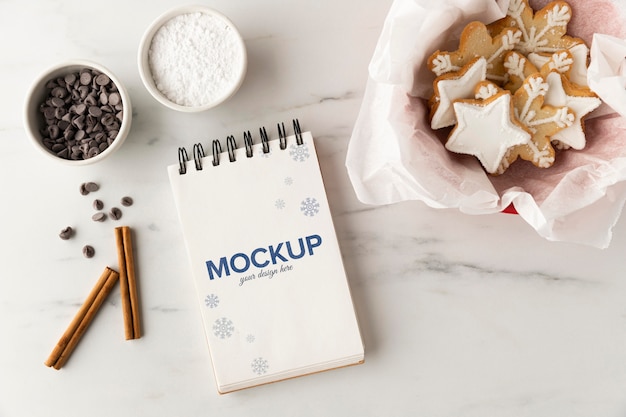 Top view of notebook with star cookies and chocolate chips