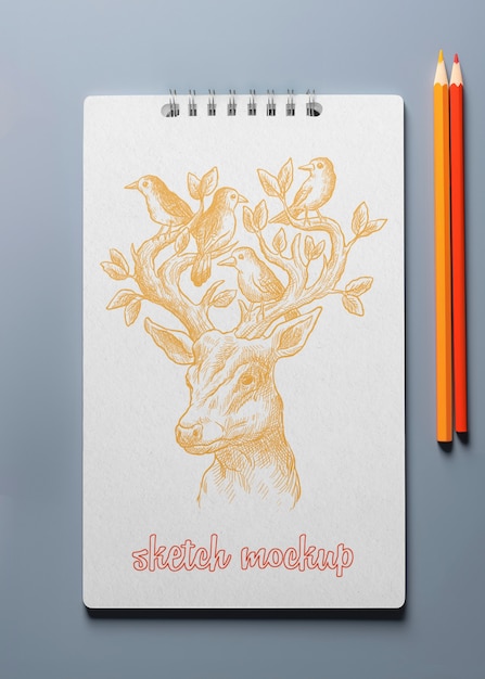 Top view on sketchbook mockup design