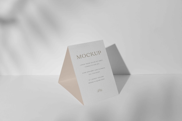 Top view on trifold wedding invitation mockup