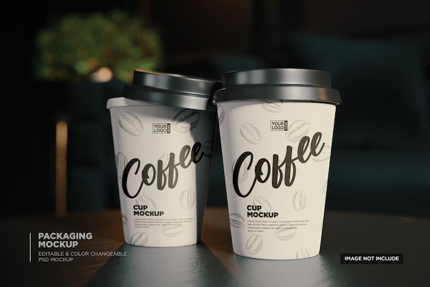 Two coffee cups with the word coffee on them