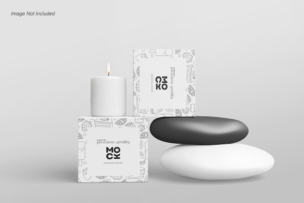 Two square paper boxes mockup with candle and stone