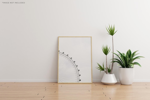 Vertical wooden photo frame mockup on white wall empty room with plants on a wooden floor