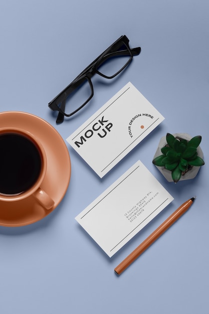 View of coffee cup with professional business card mock-up