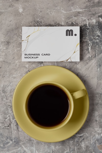 View of coffee cup with professional business card mock-up