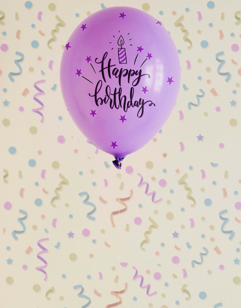 Violet happy birthday doodle balloons with blurred confetti