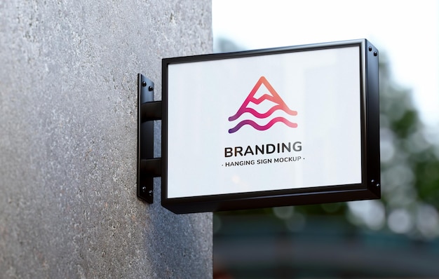 Wall sign mockup hung on a store facade Outdoor business signage template for branding in 3D