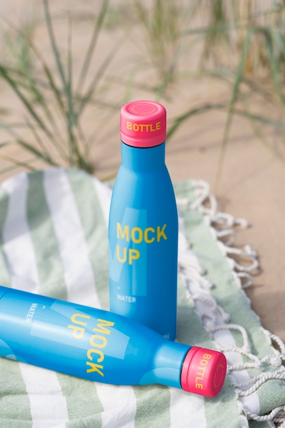 Water drop bottle mockup in nature