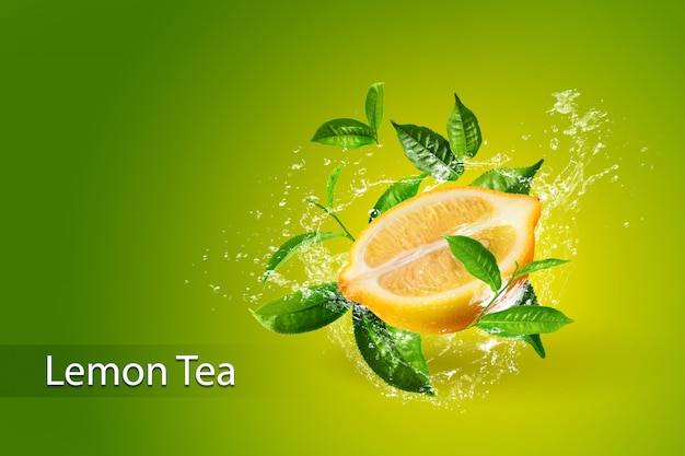 Water splashing on Lemon and Green tea leaf isolated on green background