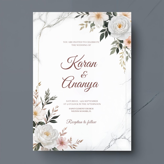 a wedding invitation with flowers on the cover