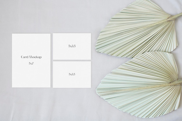 Wedding suite mockup with leaf palm on the beige background