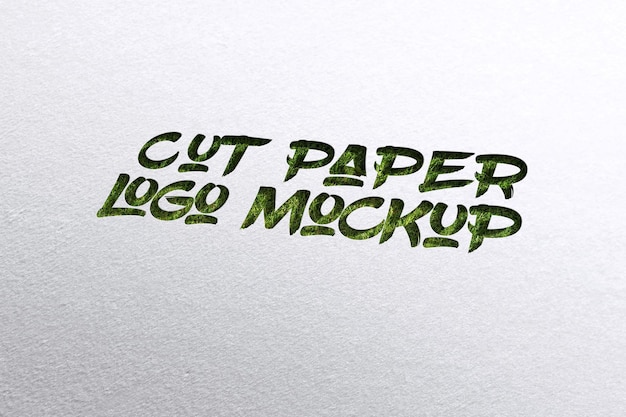 a white paper that says cut paper cut out on it paper logo mockup Realistic Paper Cut Logo Mockup