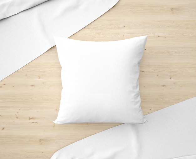 PSD white pillow with bedsheets on the floor