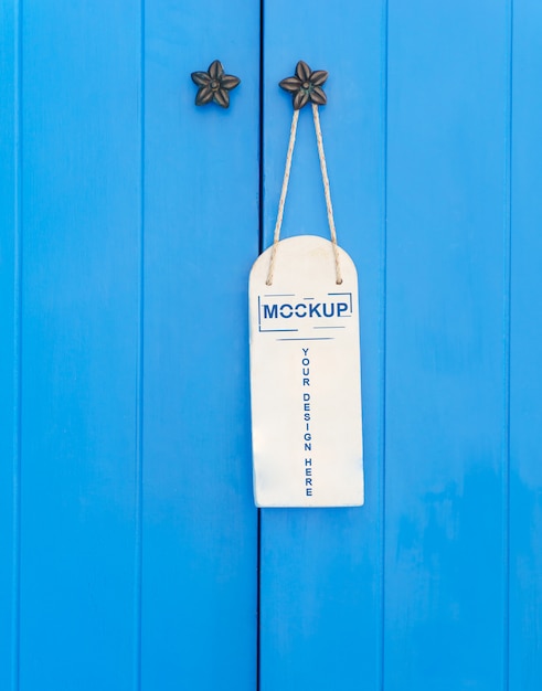 White tag hanging at the door mockup