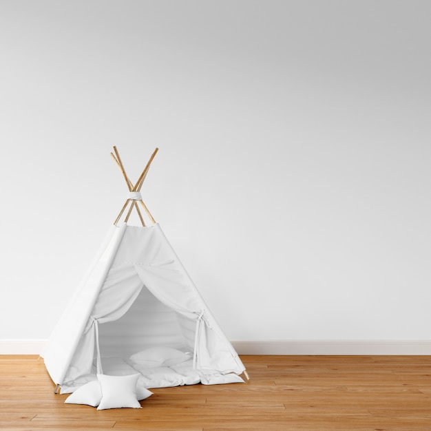 white teepee on wooden floor