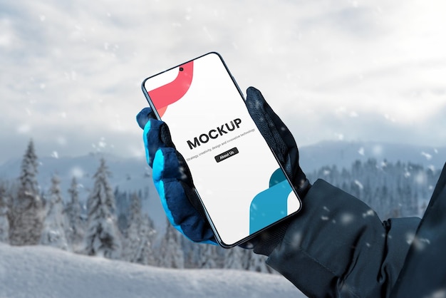 Winter smart phone in man hand with glove mockup