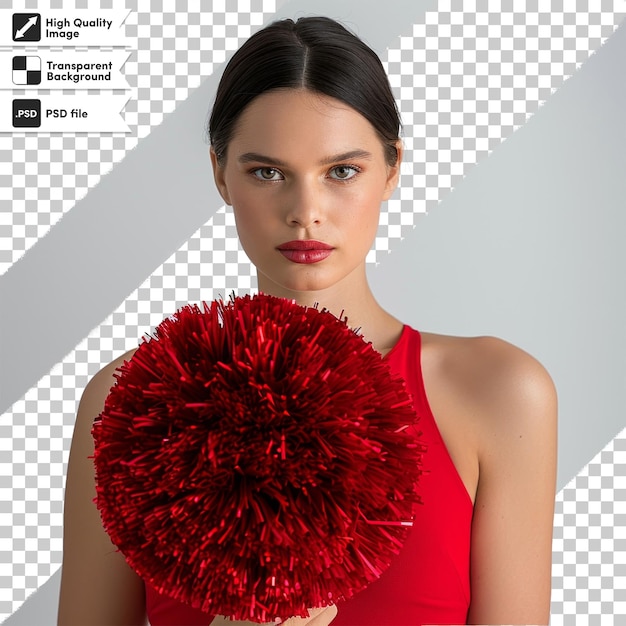 a woman in a red dress holds a red pom pom