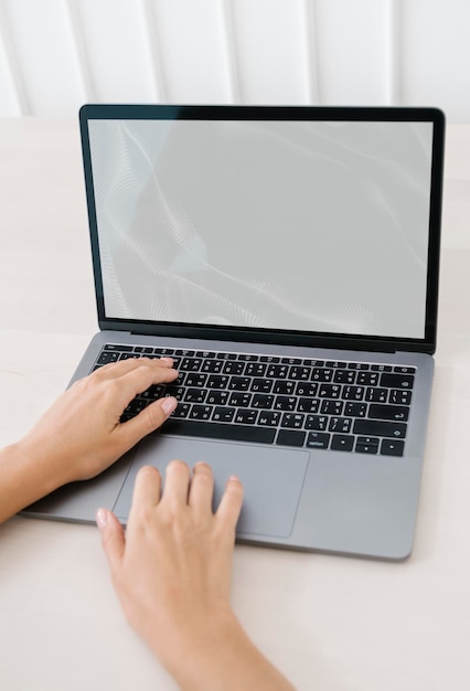 Woman using a laptop mockup