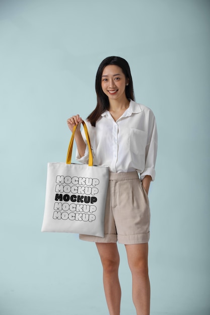 Woman wearing beach bag mockup