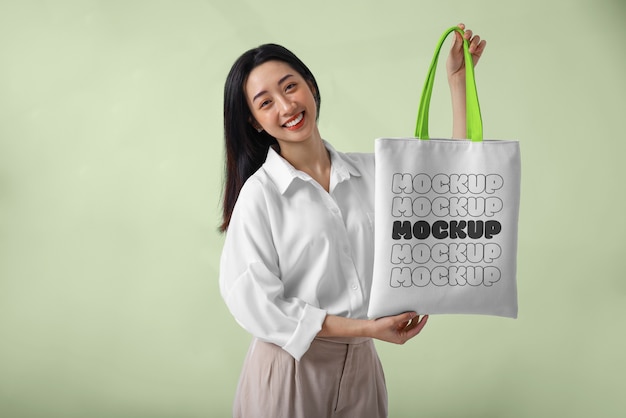 Woman wearing beach bag mockup