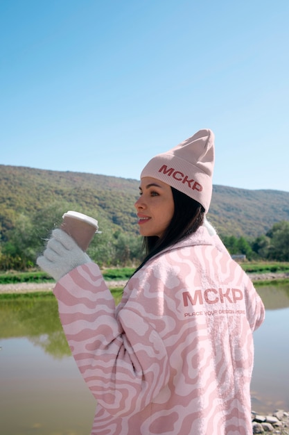 Woman wearing hoodie mockup for cold exposure