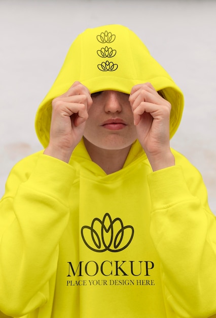 Woman wearing a mock-up hoodie