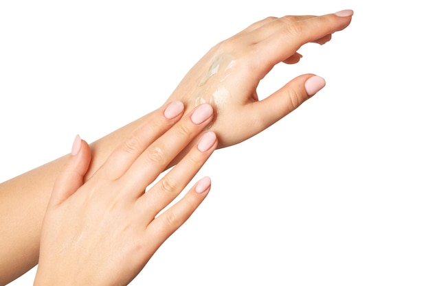 Womens hands Transparent gel spreads over the skin on a blank background