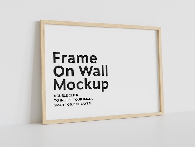 Wood frame leaning on white wall Mockup