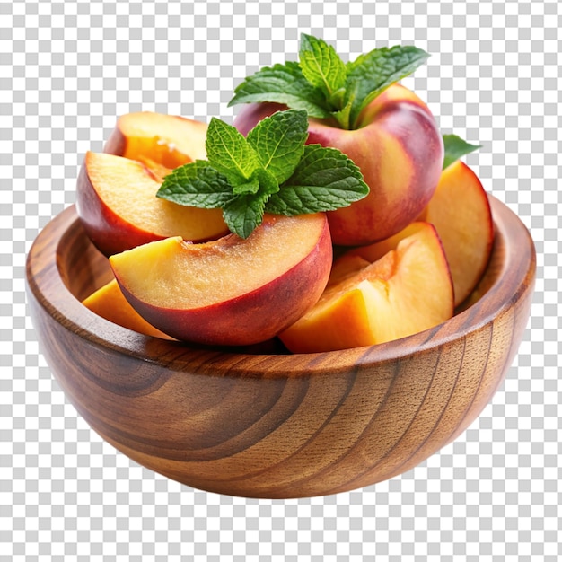 A wooden bowl with sliced peaches and green leaves on transparent background