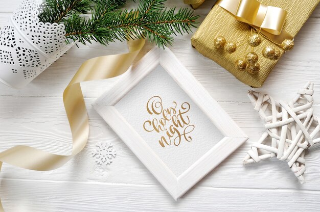 Wooden frame mockup, boxes in craft paper with satin golden ribbon for xmas